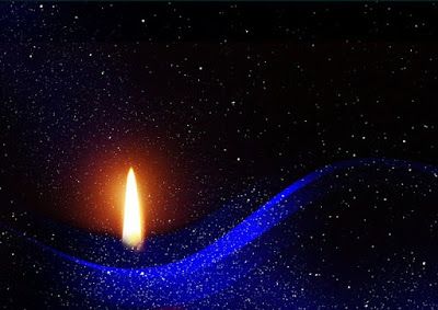 Candle in a new moon sky
